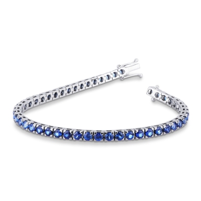 Bracelet tennis en or blanc 18k avec saphir bleu