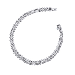 Bracelet design tissé en or blanc 18k serti de diamants