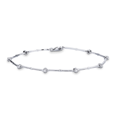 Bracelet tennis alterné en or blanc 18 carats avec diamants