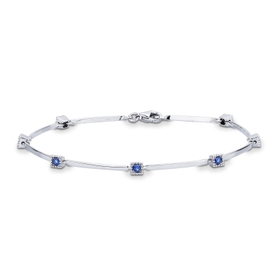 Bracelet alterné en or blanc 18 carats avec saphirs bleus