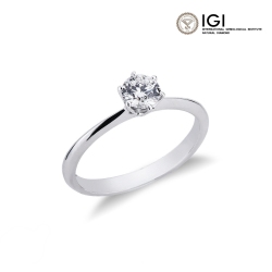 Bague solitaire or blanc 18 carats avec diamant IGI 0.49 CT