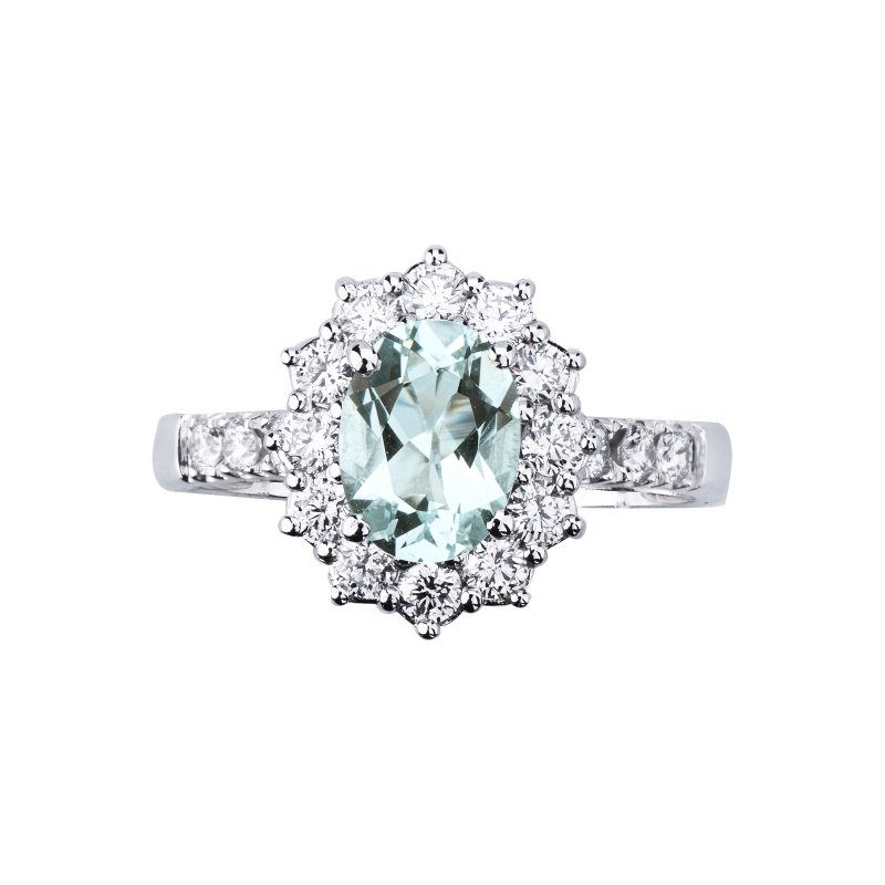 Bague en or blanc 18k avec une aquamarine ovale entourée de diamants  Bague en or blanc 18k avec une aquamarine ovale entourée de diamants