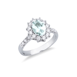 Bague en or blanc 18k avec une aquamarine ovale entourée de diamants