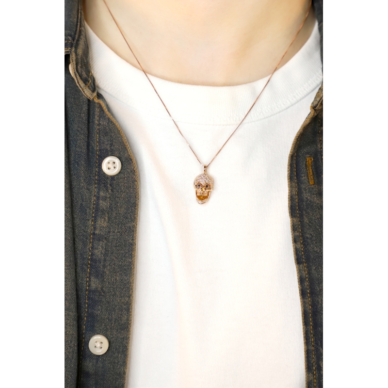 Collier en or rose 18k avec pendentif tête de mort mobile Collier en or rose 18k avec pendentif tête de mort mobile