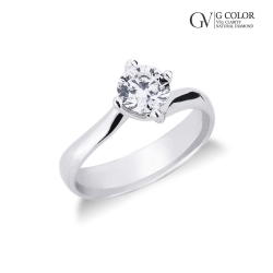 Bague solitaire à quatre griffes avec bandeau contrarié ct. 0,90