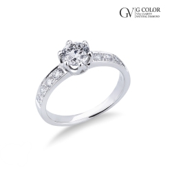 Bague en or blanc 18 carats avec diamants et pierre centrale 0,90 ct
