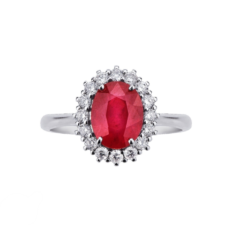 Bague en or blanc 18k avec rubis ovale et entourage de diamants