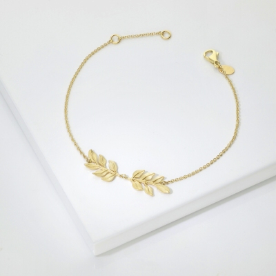 Bracelet en or jaune 18k avec deux feuilles brillantes et satinées