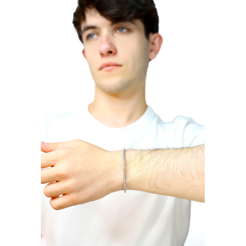 Bracelet tennis griffe elastique en or blanc 750 avec diamants