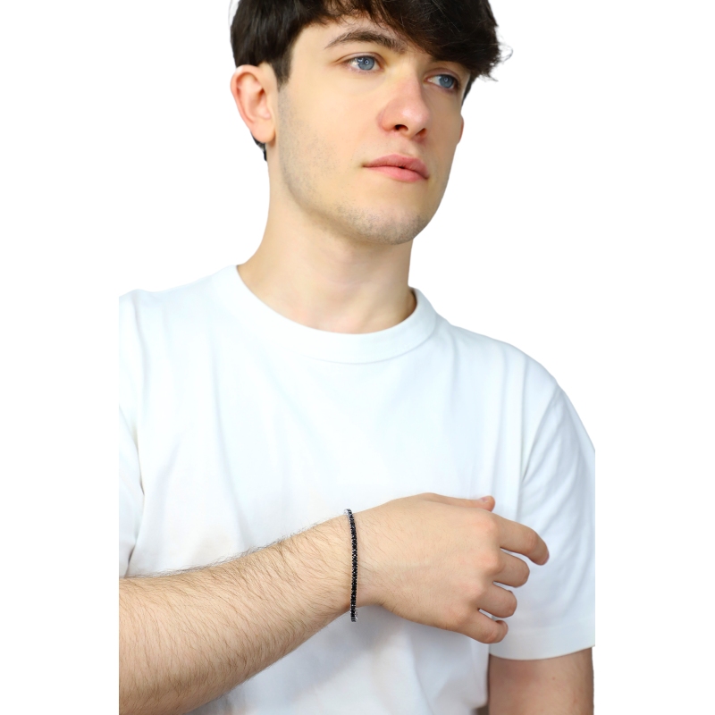 Bracelet tennis élastique griffé avec diamants noirs en or blanc 18k