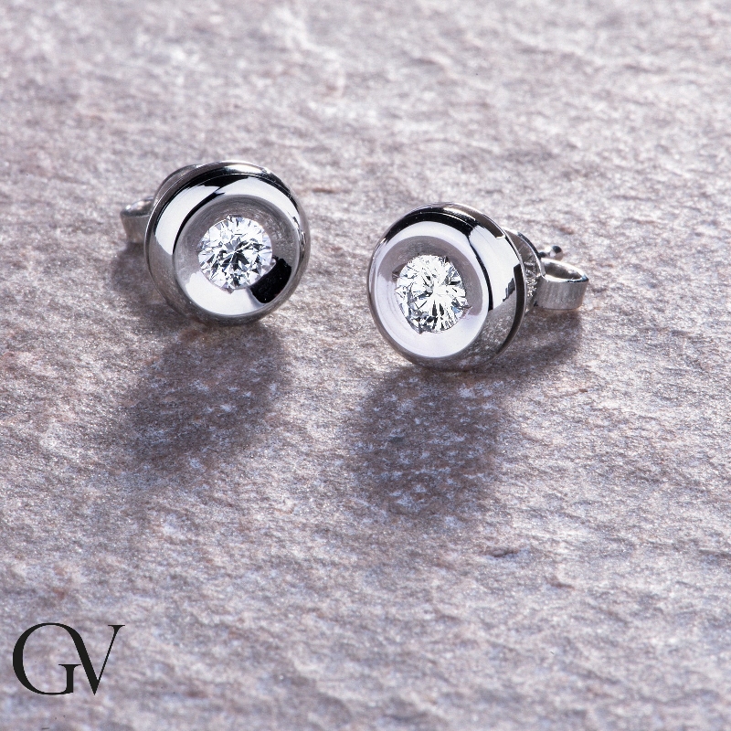 Boucles d'oreilles diamants 0.40 ct serti clos or blanc 18k