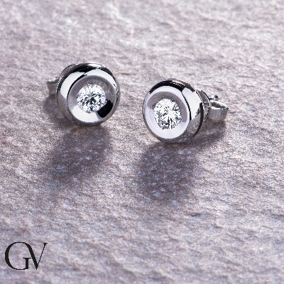 Boucles d'oreilles diamants 0.40 ct serti clos or blanc 18k