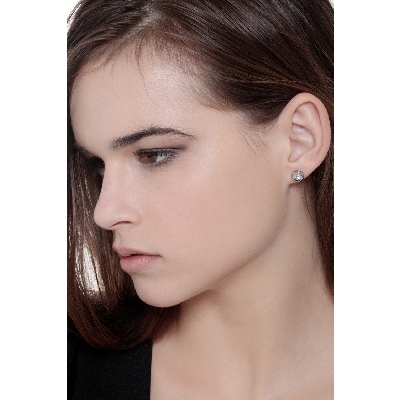 Boucles d'oreilles diamants 0.40 ct serti clos or blanc 18k