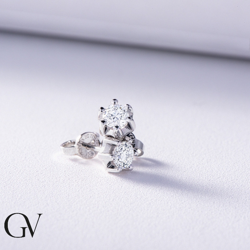 Puces d'oreilles or blanc 750 diamant 0.60 ct 