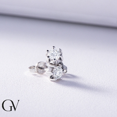 Puces d'oreilles or blanc 750 diamant 0.60 ct 