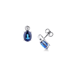 Puces en or blanc 18k avec diamants et saphirs bleus