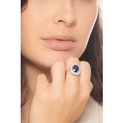 Bague en or blanc 18 carats ornée d’un saphir bleu central 2