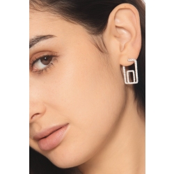 Boucles d’oreilles géométriques en or blanc avec diamants 2