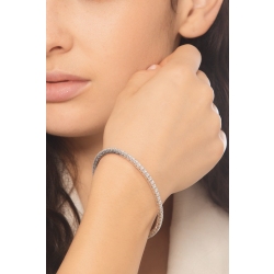 Bracelet tennis griffe elastique en or blanc 750 avec diamants 2