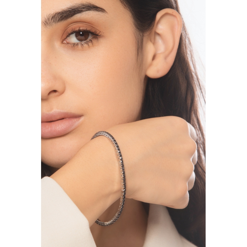 Bracelet tennis elastique avec diamants noirs en or blanc 750