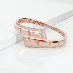 Bracelet semi-rigide à ressort en or rose 18k avec diamants