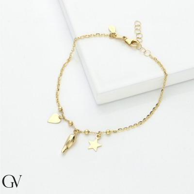 Bracelet en or jaune 18k avec charms porte-bonheur