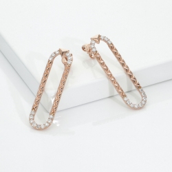 Boucles d oreilles en or rose 18K avec détails diamants
