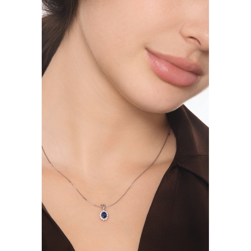 Collier contourné en or blanc 18k avec saphir et diamants