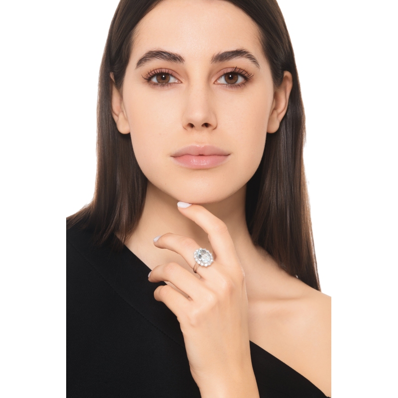 Bague contournée or 18k avec aigue-marine ovale et 14 diamants
