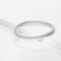 Bracelet élastique design en or blanc 18k avec diamants