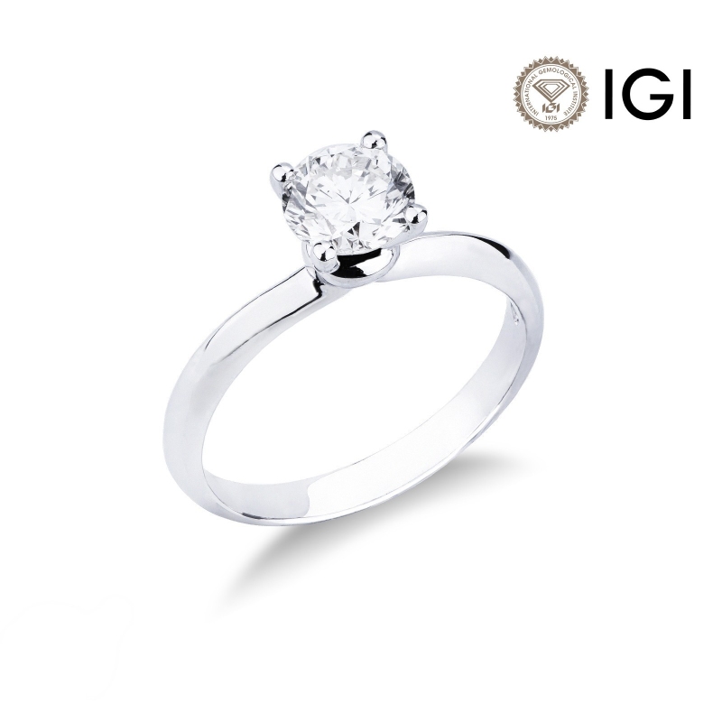 Bague solitaire or blanc 18 carats avec diamant 0.90 ct