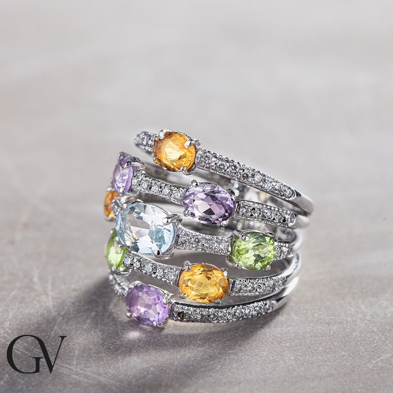 Bague bandeau en or 18ct avec péridot, citrine, améthyste, aigue-marine et diamants Bague bandeau en or 18ct avec péridot, citrine, améthyste, aigue-marine et diamants