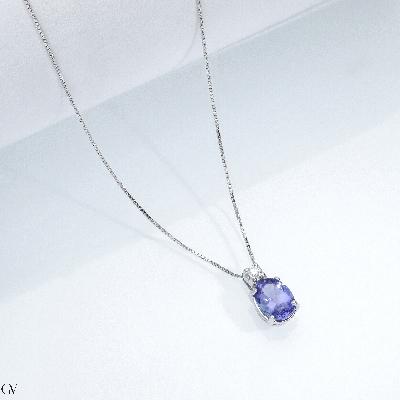 Collier en or blanc 18k avec pendentif en tanzanite 
