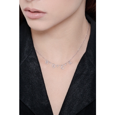 Collier en or blanc 18k avec le mot ROCK en diamants