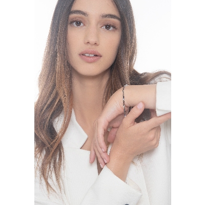 Bracelet tennis en or blanc 750 avec diamants noirs