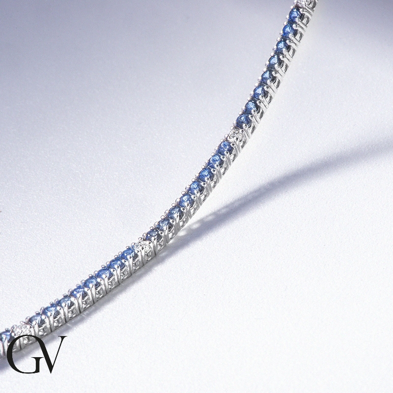 Bracelet Tennis en or blanc 18k avec diamants et saphirs bleus Bracelet Tennis en or blanc 18k avec diamants et saphirs bleus