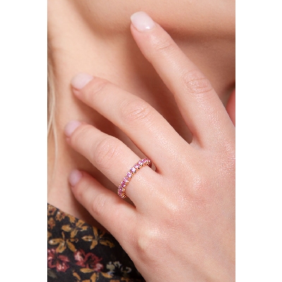 Bague Eternity en or rose 18 carats sertie saphirs roses