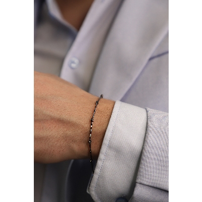 Bracelet alterné en or bruni 18 carats avec diamants noirs