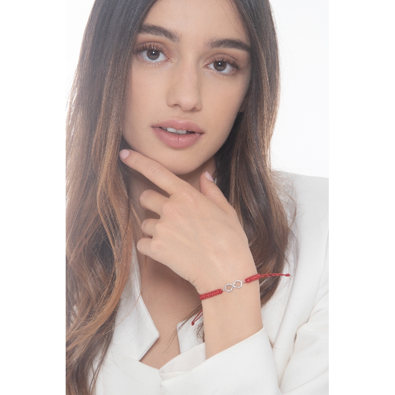 Bracelet avec symbole infini en or blanc 18k et diamants Bracelet avec symbole infini en or blanc 18k et diamants