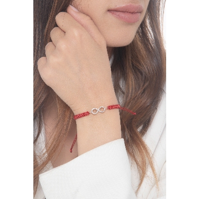 Bracelet avec symbole infini en or blanc 18k et diamants